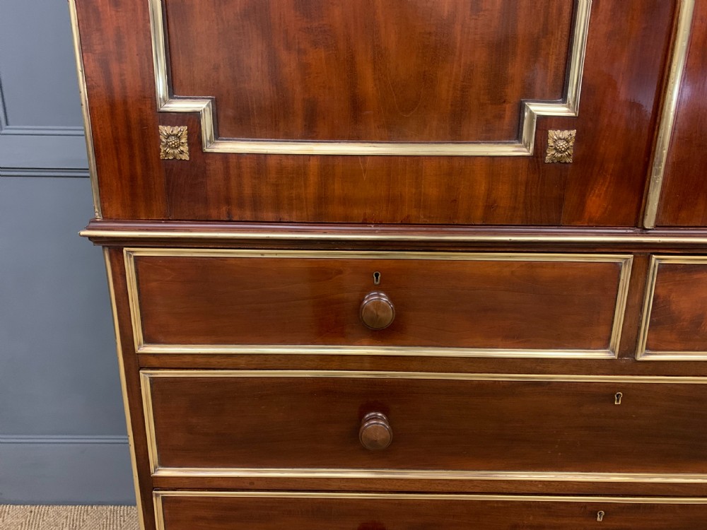 Early 19th Century Brass Mounted Flame Mahogany Linen Press View VII