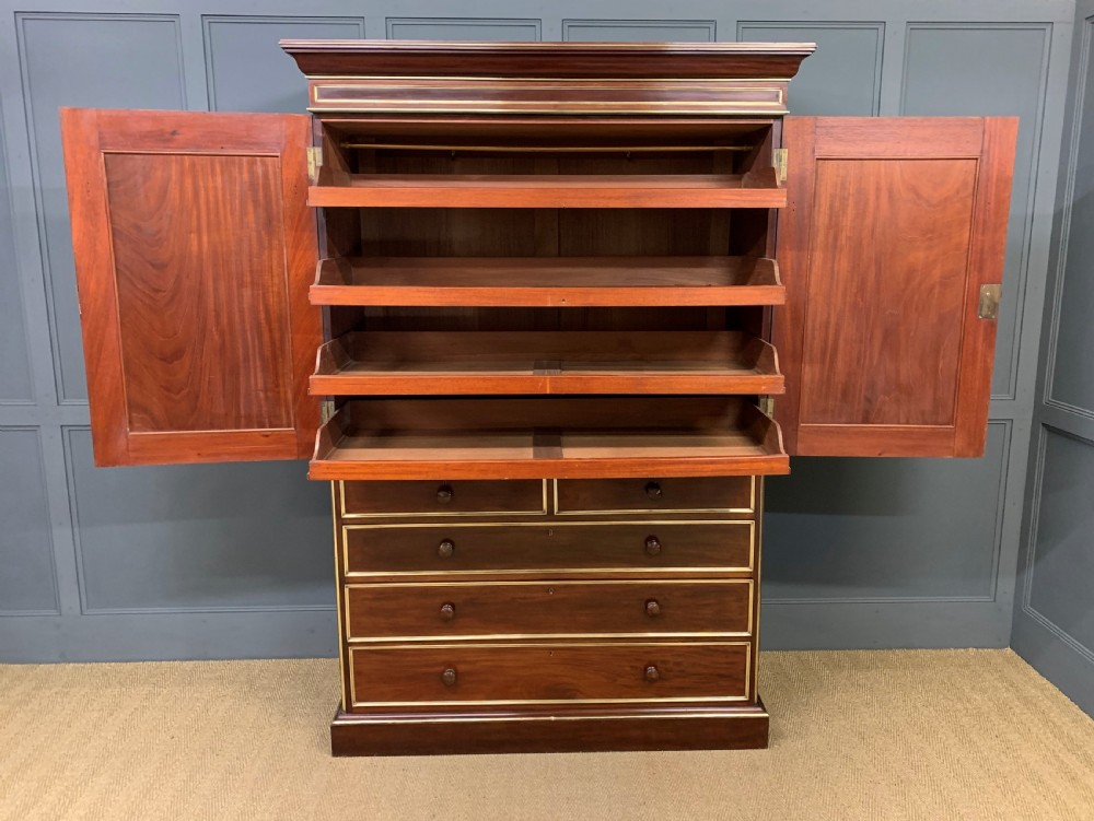 Early 19th Century Brass Mounted Flame Mahogany Linen Press View XVI