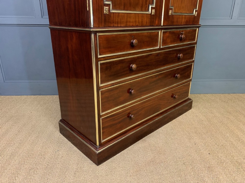 Early 19th Century Brass Mounted Flame Mahogany Linen Press View XVII