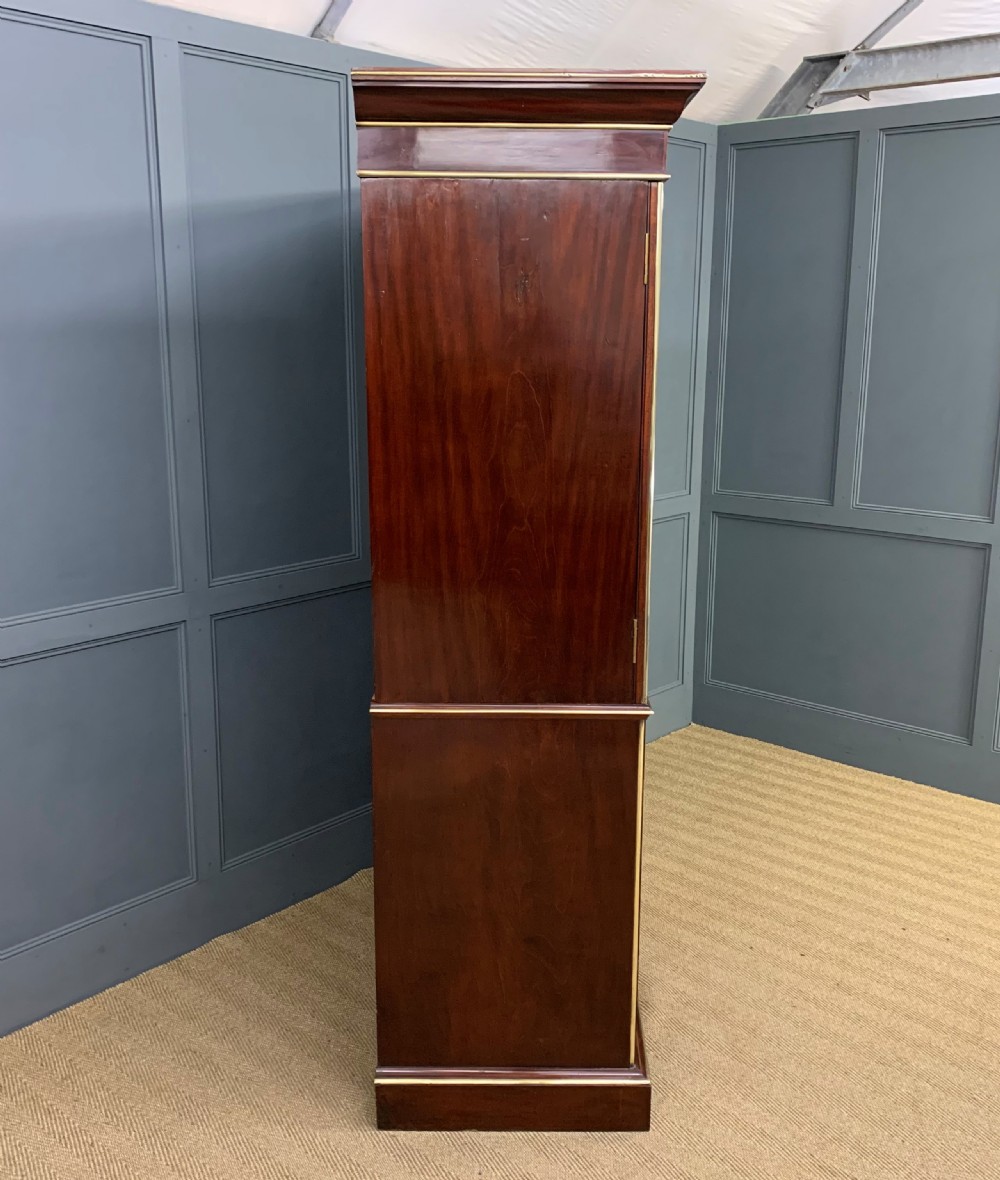 Early 19th Century Brass Mounted Flame Mahogany Linen Press View XVIII