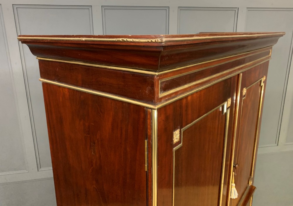 Early 19th Century Brass Mounted Flame Mahogany Linen Press View XX