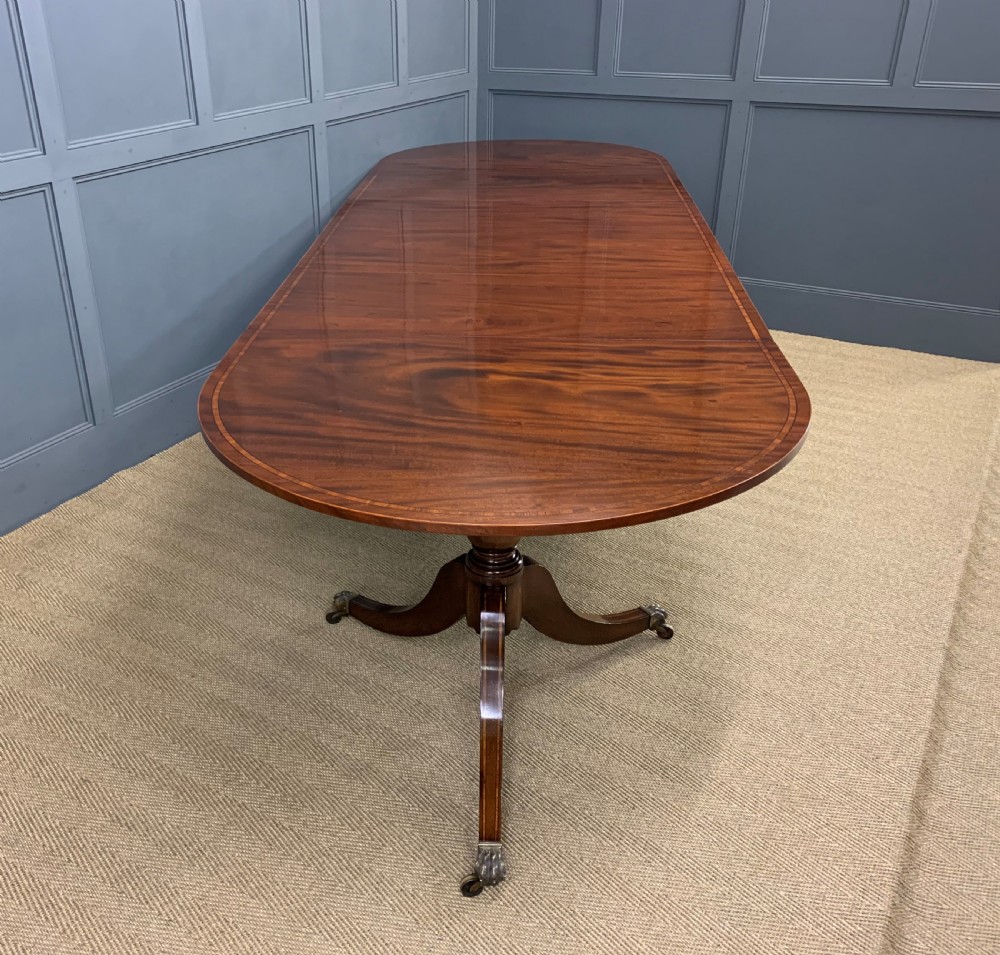 Flame Mahogany Triple Pillar Dining Table View III