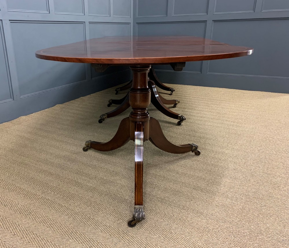 Flame Mahogany Triple Pillar Dining Table View XIII