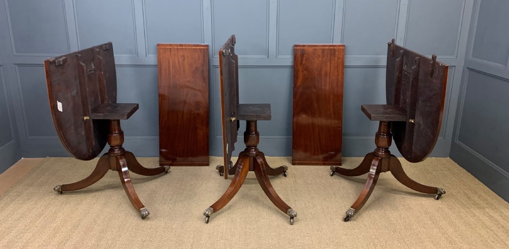 Flame Mahogany Triple Pillar Dining Table View XVII
