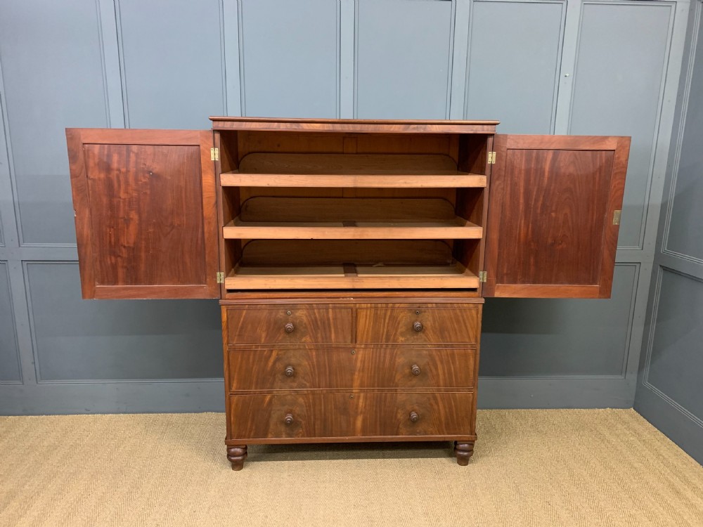 Early 19th Century Flame Mahogany Linen Press View V