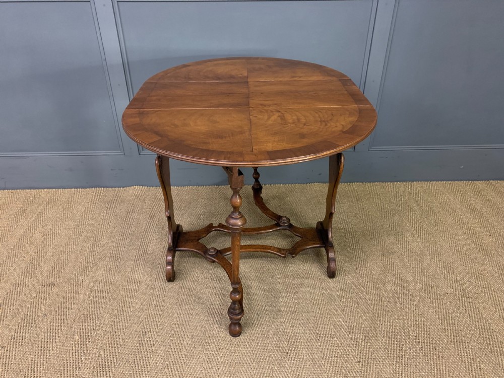 Burr Walnut and Oak Sutherland Table View X