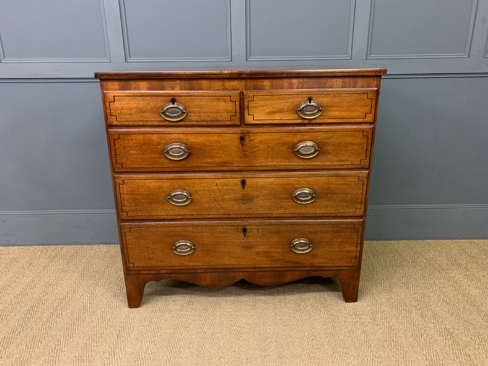 Regency Period Inlaid Mahogany Chest of Drawers View II