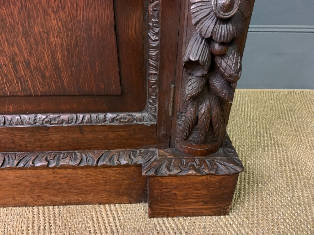 Imposing Carved Oak Bookcase View VIII