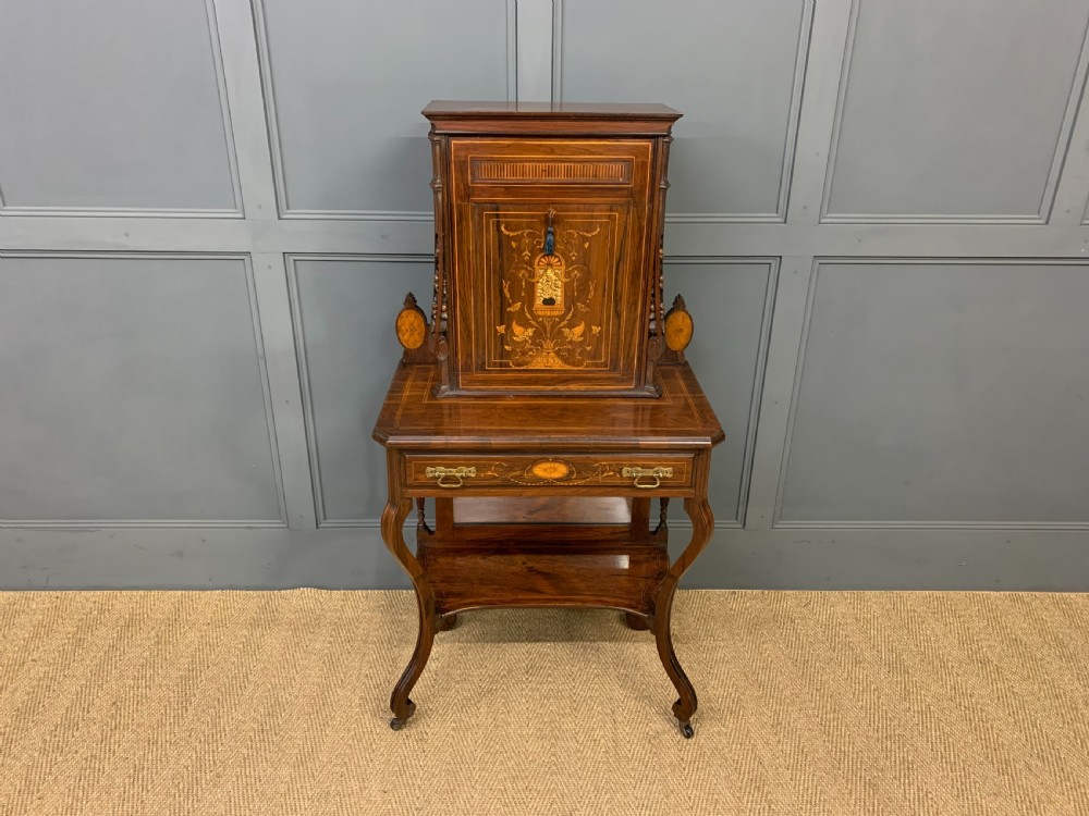 An antique inlaid rosewood bonheur du jour writing desk featuring a raised central cupboard with marquetry detail, single frieze drawer, and cabriole legs. View III