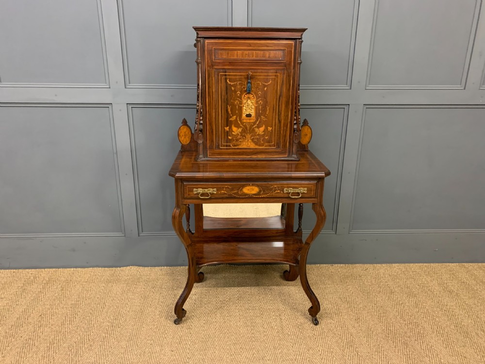 An antique inlaid rosewood bonheur du jour writing desk featuring a raised central cupboard with marquetry detail, single frieze drawer, and cabriole legs. View IV