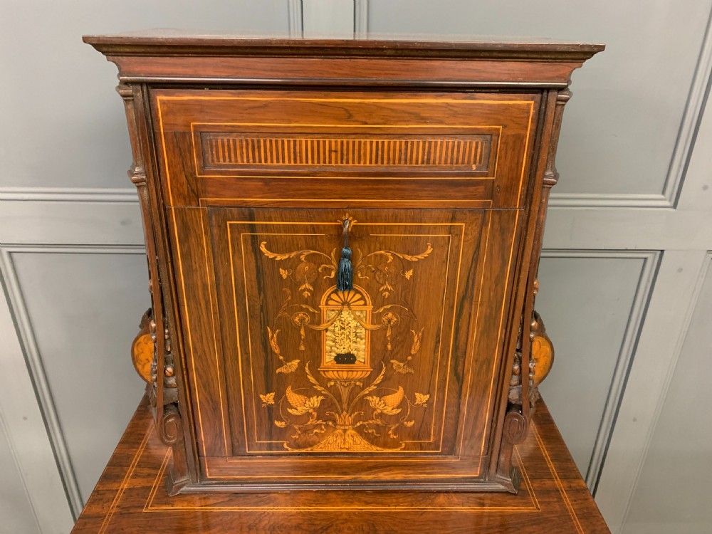 An antique inlaid rosewood bonheur du jour writing desk featuring a raised central cupboard with marquetry detail, single frieze drawer, and cabriole legs. View VII