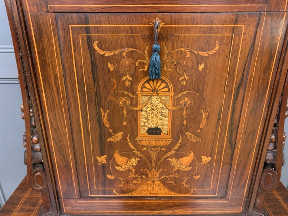 An antique inlaid rosewood bonheur du jour writing desk featuring a raised central cupboard with marquetry detail, single frieze drawer, and cabriole legs. View VIII