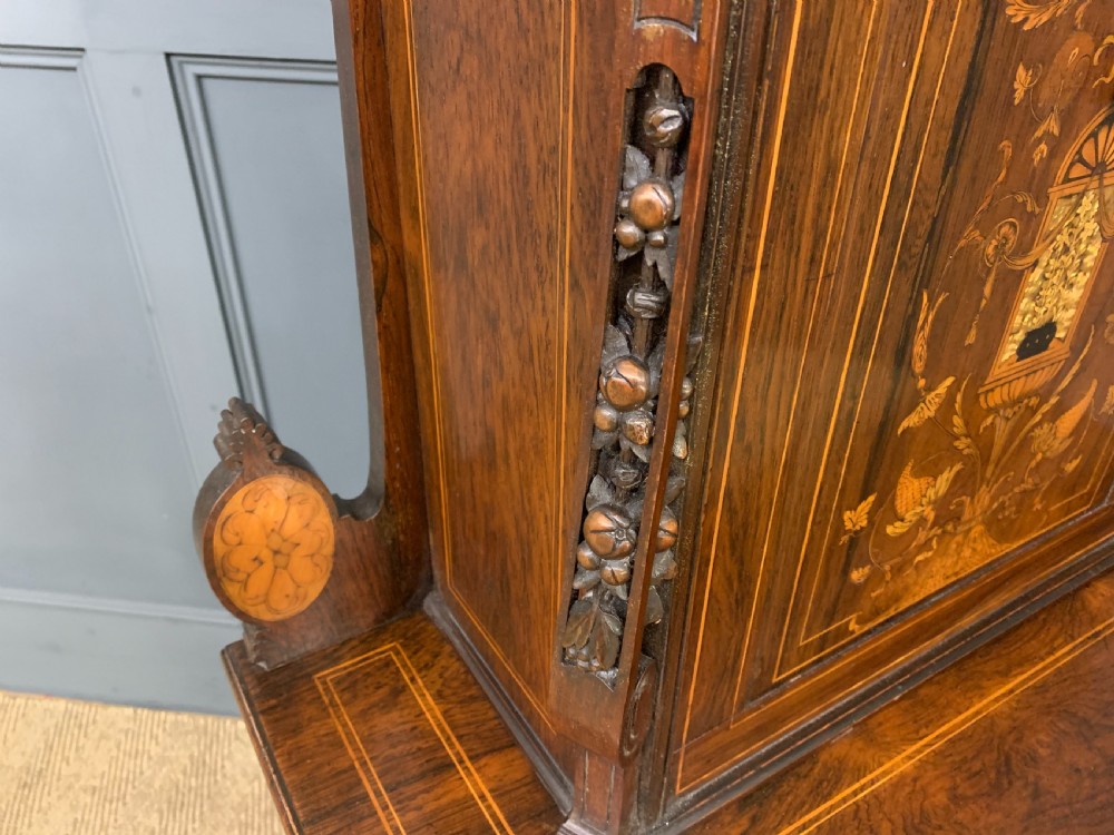 An antique inlaid rosewood bonheur du jour writing desk featuring a raised central cupboard with marquetry detail, single frieze drawer, and cabriole legs. View XIII