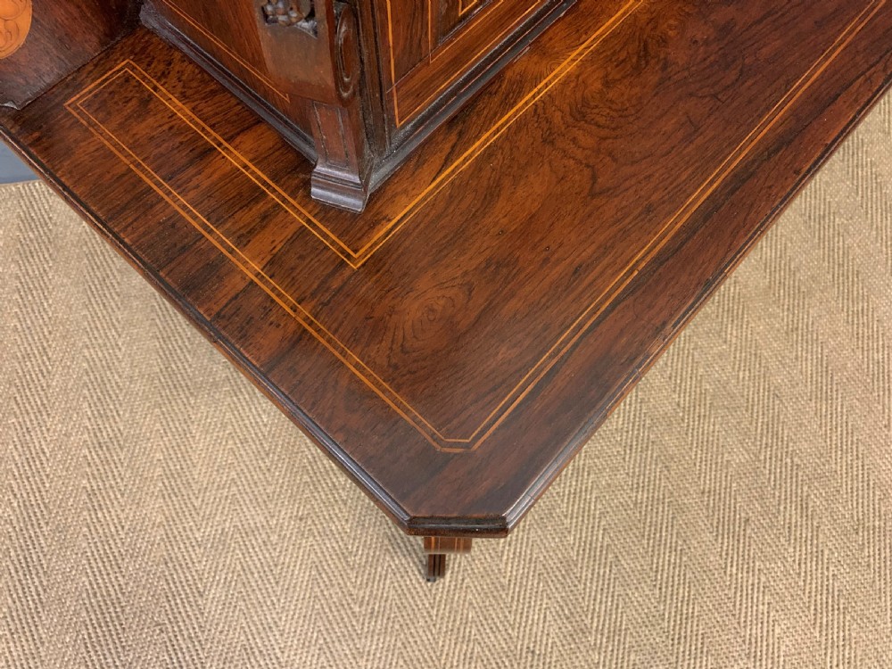 An antique inlaid rosewood bonheur du jour writing desk featuring a raised central cupboard with marquetry detail, single frieze drawer, and cabriole legs. View XV