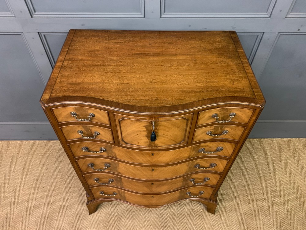 Maple & Co Serpentine Fronted Chest of Drawers View IV