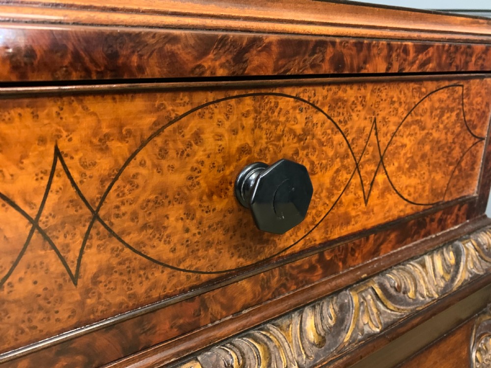 A burr walnut side table featuring two drawers with feather banding, carved egg-and-dart moulding, gilded accents, cabriole legs, and ball-and-claw feet. View XIII