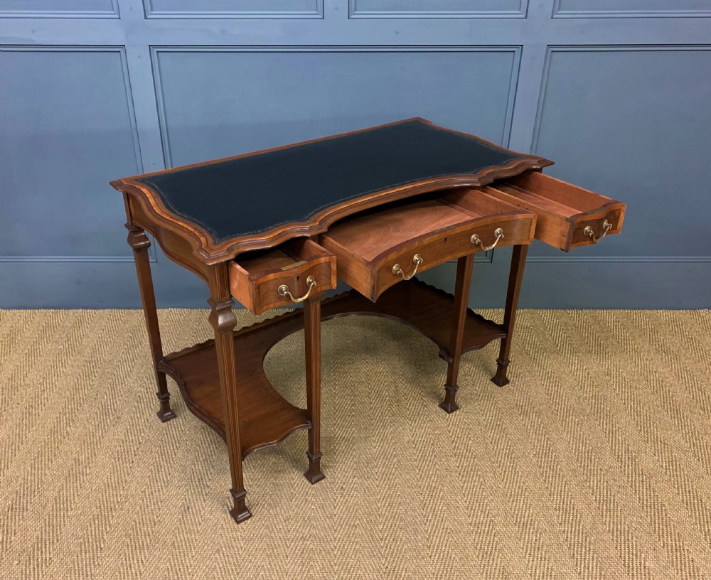 Serpentine Shaped Inlaid Mahogany Writing Table View XIV