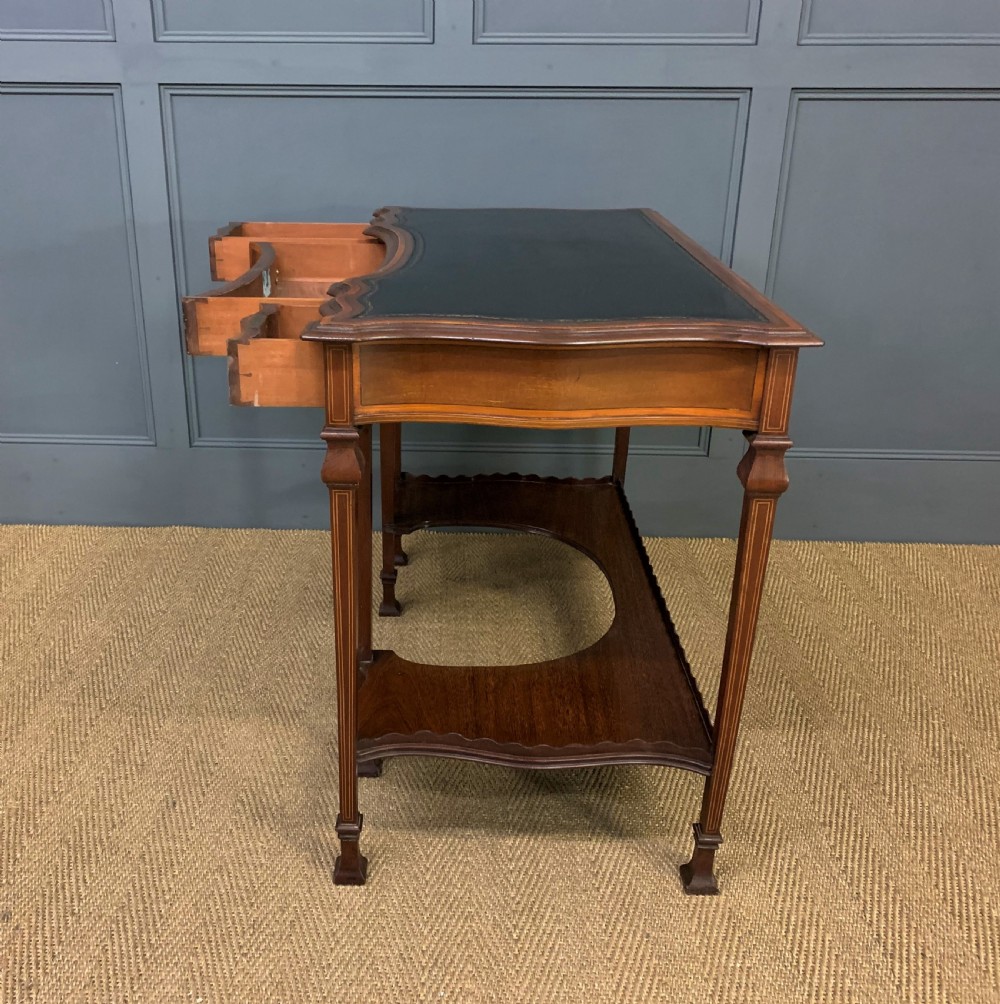 Serpentine Shaped Inlaid Mahogany Writing Table View XVI