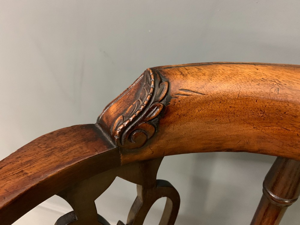 A Georgian style walnut corner chair with a curved crest rail, pierced back splats, a tapestry seat pad, and a central cabriole front leg ending in a claw and ball foot. View III