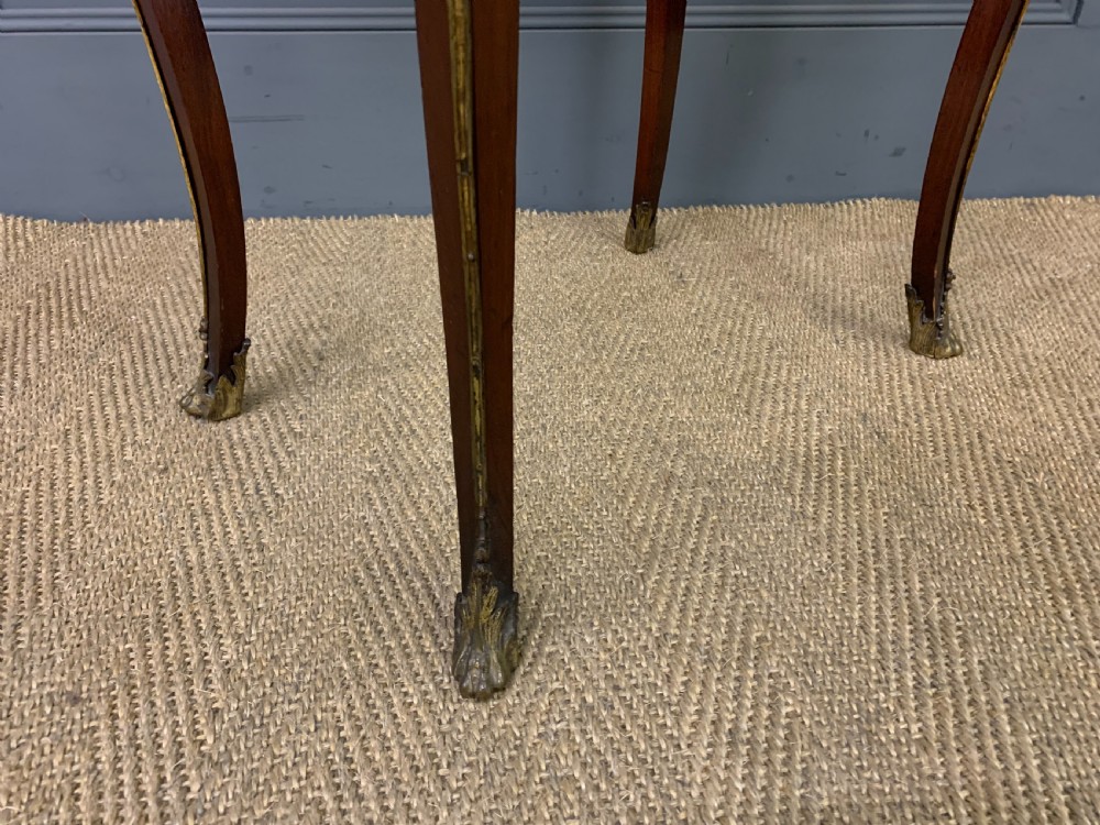 A rectangular dark mahogany side table featuring slender cabriole legs, gilt bronze corner mounts, and a decorative ormolu relief plaque on the frieze. View VIII