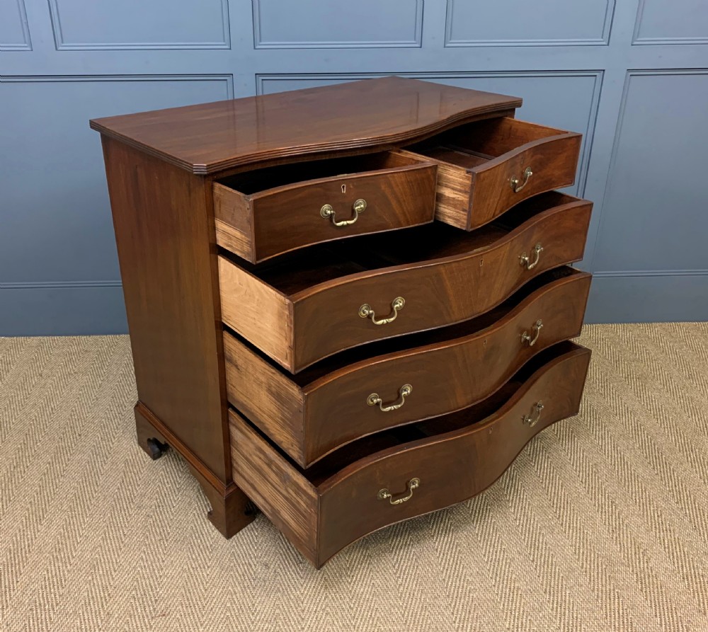 Serpentine Mahogany Chest of Drawers View XI