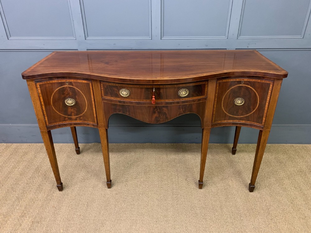 Georgian Inlaid Mahogany Serpentine Sideboard View IV