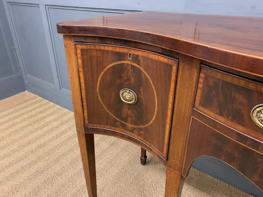 Georgian Inlaid Mahogany Serpentine Sideboard View V