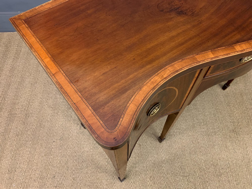 Georgian Inlaid Mahogany Serpentine Sideboard View X