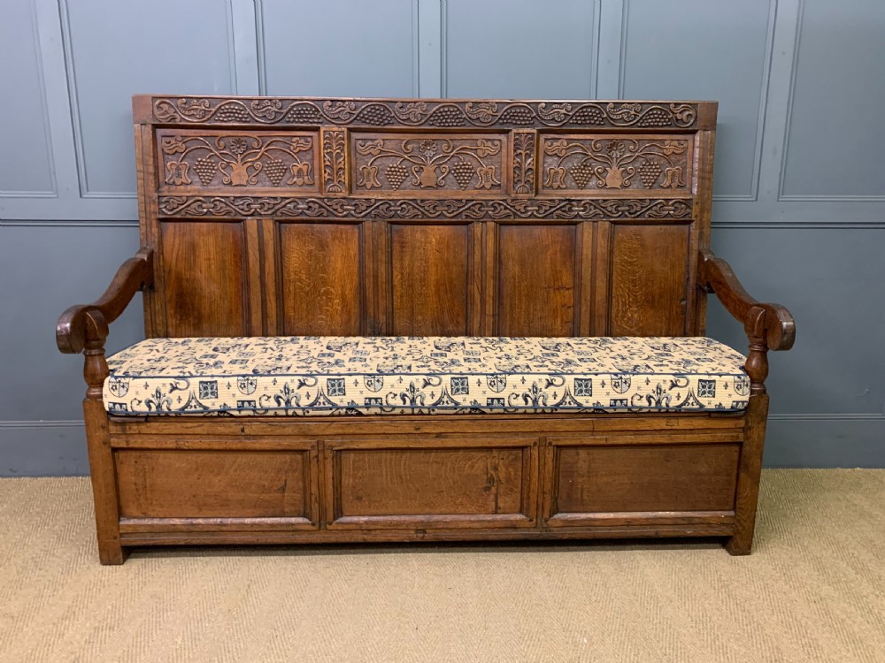 Large 18th Century Carved Oak Settle View II