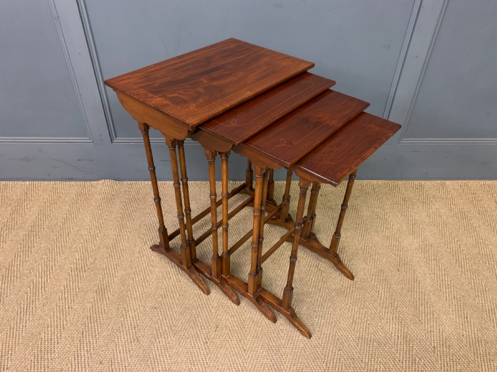 Nest of 4 Inlaid Mahogany Tables
