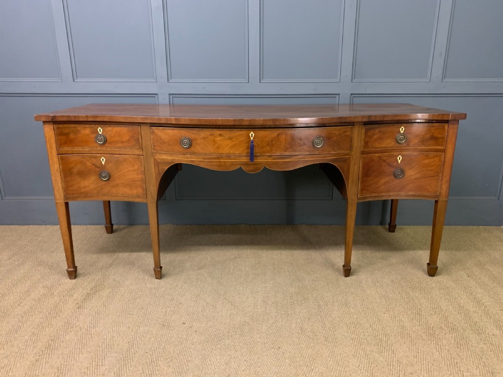 Large Georgian Serpentine Inlaid Mahogany Sideboard