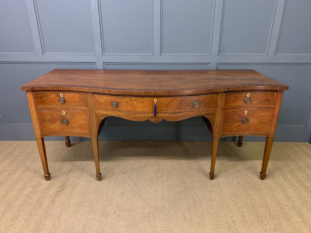 Large Georgian Serpentine Inlaid Mahogany Sideboard View II