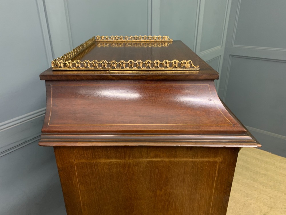 A freestanding mahogany vitrine featuring floral marquetry, a single glazed door, a brass top gallery, and cabriole legs with metal mounts. View XIV