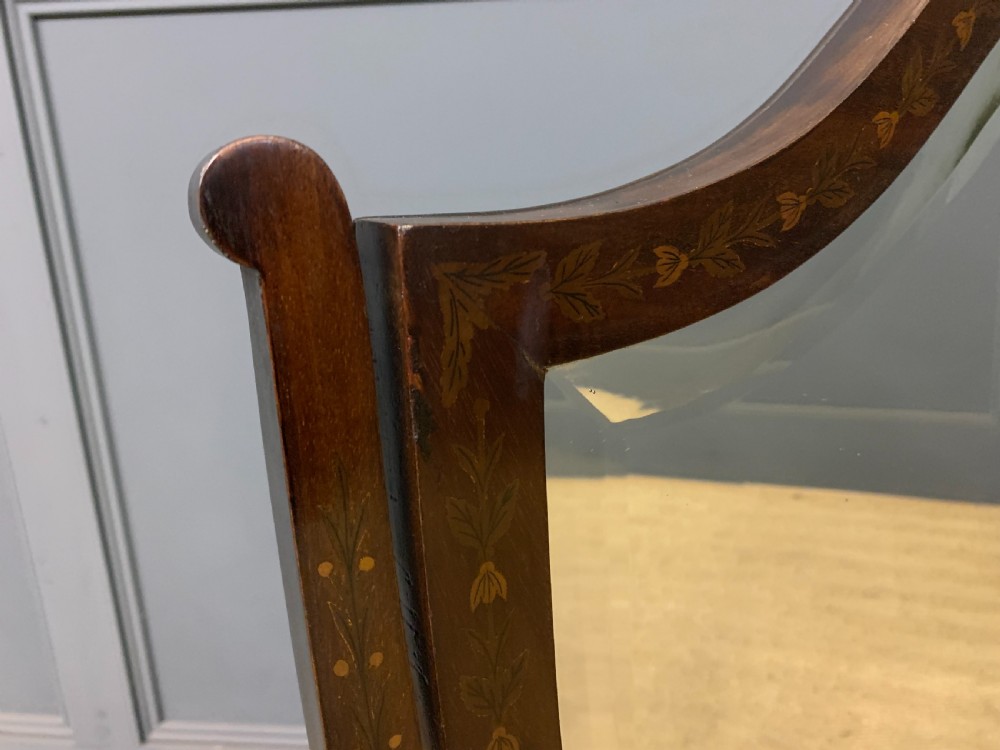 A Georgian mahogany toilet mirror featuring a shield-shaped swing frame, inlaid satinwood urn motifs, and a drawer base with curved fronting. View VIII