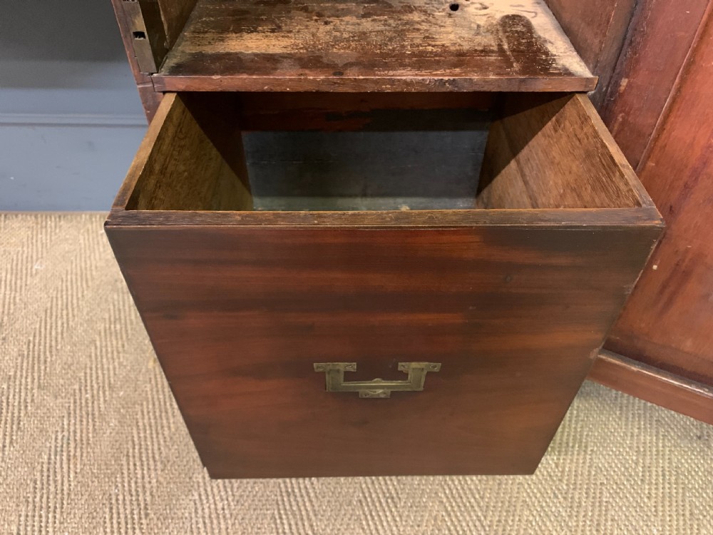 A George III inlaid mahogany pedestal sideboard featuring twin cupboard pedestals decorated with urn marquetry and a shaped backboard. View XVIII