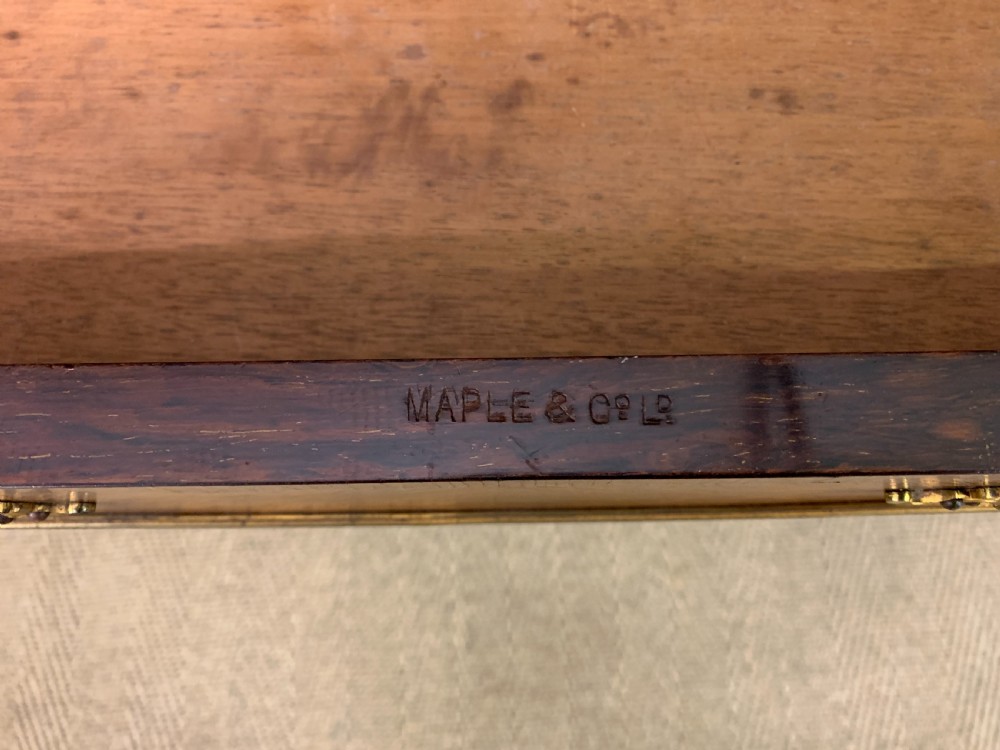 An Edwardian inlaid rosewood envelope card table featuring cabriole legs with brass mounts, a single drawer, and top flaps decorated with floral and musical instrument marquetry. View XII
