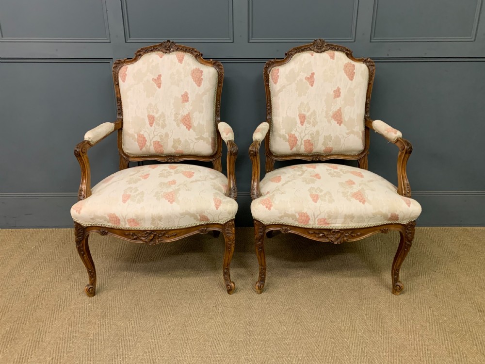 Pair of French Carved Walnut Armchairs View II