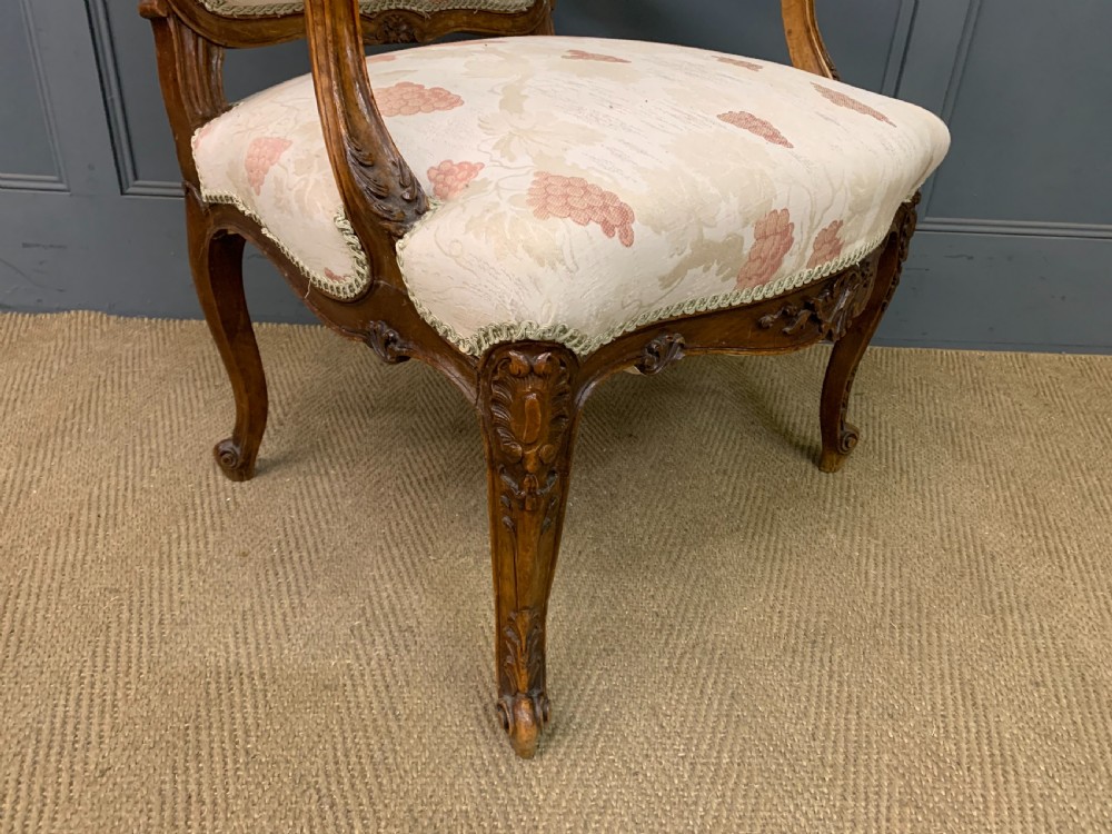 Pair of French Carved Walnut Armchairs View XIV