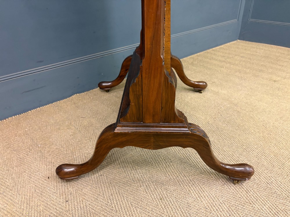 A Queen Anne style walnut cheval mirror with an arched frame, carved shell motif, finial posts, and cabriole legs. View XII