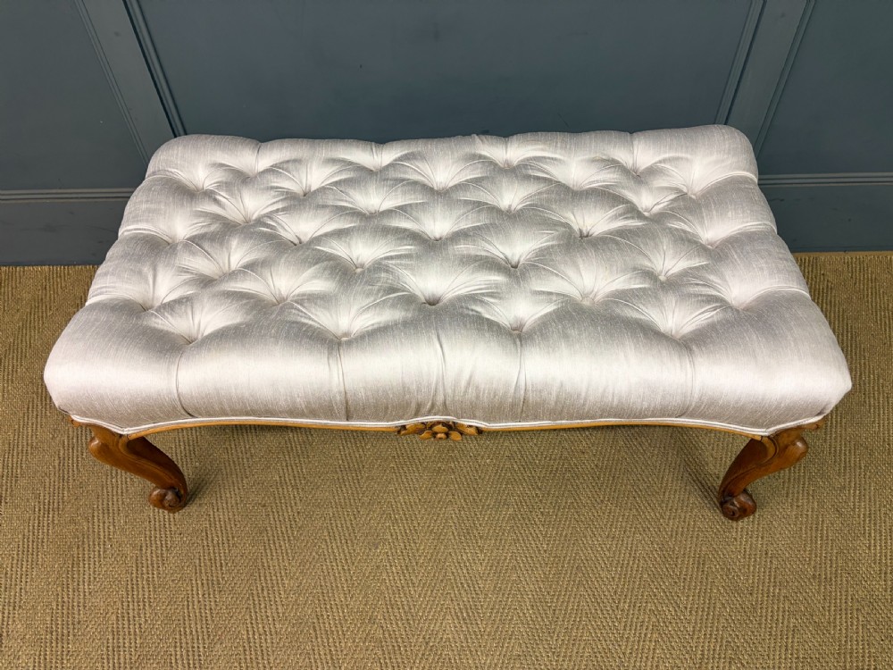 A large rectangular Victorian rosewood stool with deep-buttoned cream upholstery and carved cabriole legs. View III