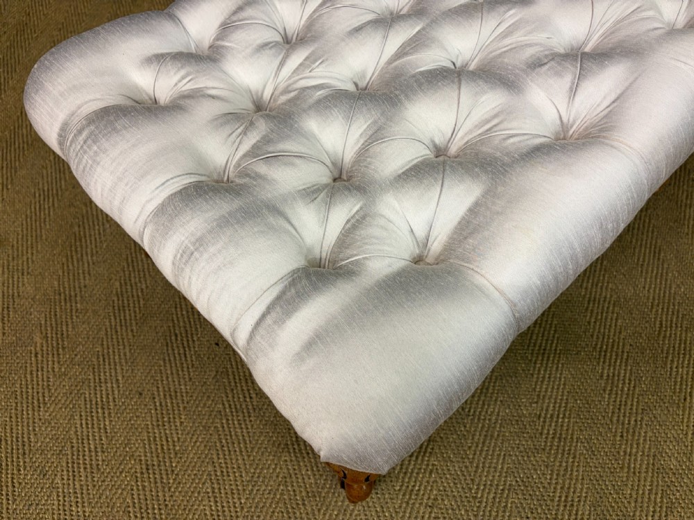 A large rectangular Victorian rosewood stool with deep-buttoned cream upholstery and carved cabriole legs. View X