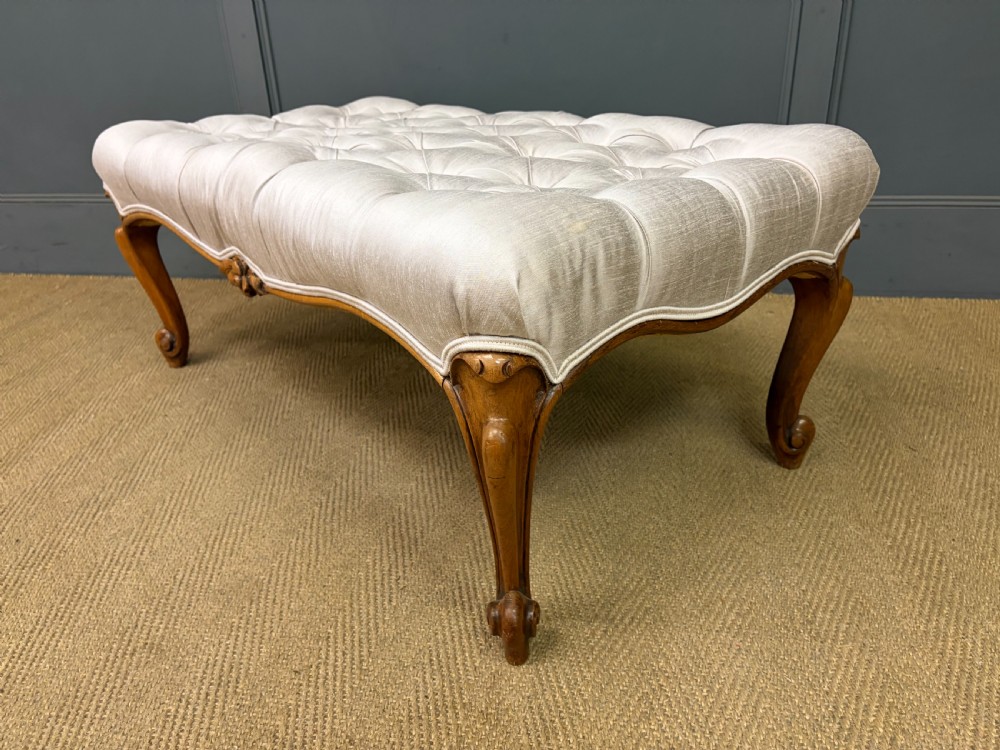 A large rectangular Victorian rosewood stool with deep-buttoned cream upholstery and carved cabriole legs. View XIII