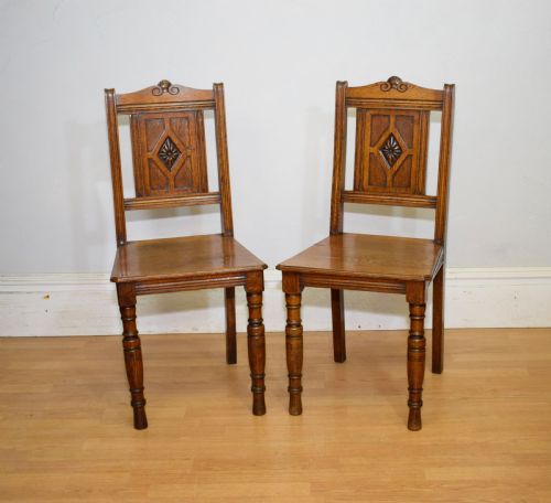PAIR OF ARTS CRAFTS OAK HALL CHAIRS - ADDITIONAL PHOTO 1