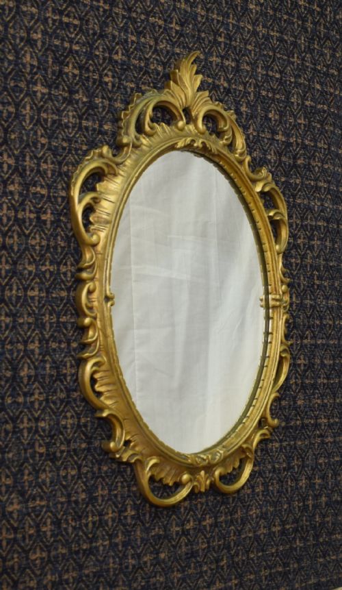 oval rococo style mirror - CATEGORY: ANTIQUE MIRRORS - DATED 1930