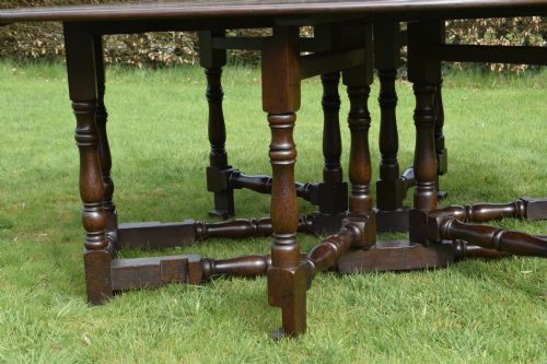 EARLY 20TH CENTURY OAK OVAL WAKE DINING TABLE - ADDITIONAL PHOTO 3