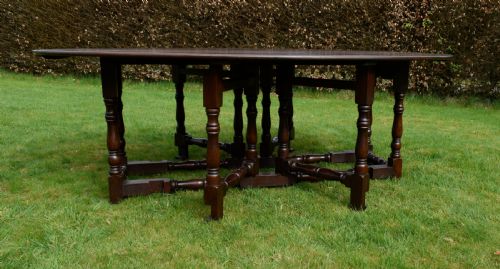 EARLY 20TH CENTURY OAK OVAL WAKE DINING TABLE - ADDITIONAL PHOTO 4