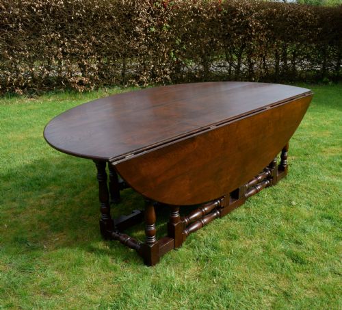 EARLY 20TH CENTURY OAK OVAL WAKE DINING TABLE - ADDITIONAL PHOTO 7
