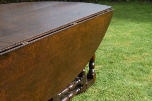 EARLY 20TH CENTURY OAK OVAL WAKE DINING TABLE - ADDITIONAL PHOTO 10