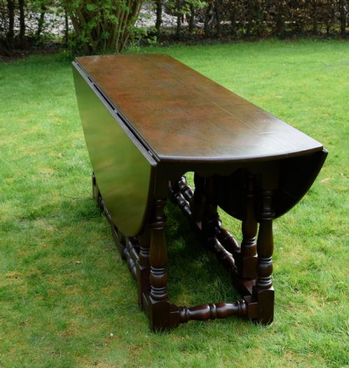 EARLY 20TH CENTURY OAK OVAL WAKE DINING TABLE - ADDITIONAL PHOTO 13