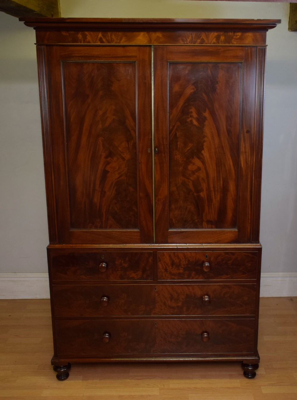 Antique Victorian Linen Press in Flame Mahogany View II